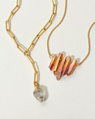 Gold chain herkimer quartz necklace and orange iridescent rough quartz necklace.