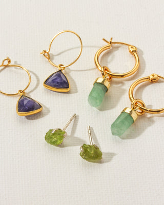 Colorful collection of three gold and silver gemstone earrings in sapphire, amazonite, and peridot.