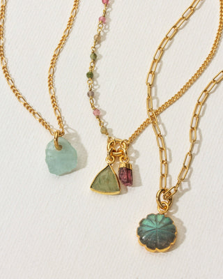 Three gold necklaces with labradorite, peridot, and aquamarine genuine stone charms.