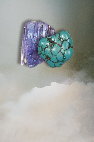 Turquoise and Tanzanite Stones on top of a grainy cloud background
