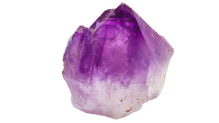 Amethyst gemstone photographed on a white background.