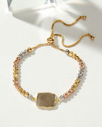 Eterno Amore Gemma Adjustable Bracelet with silver, gold, and rose gold beads and pyrite gemstone.