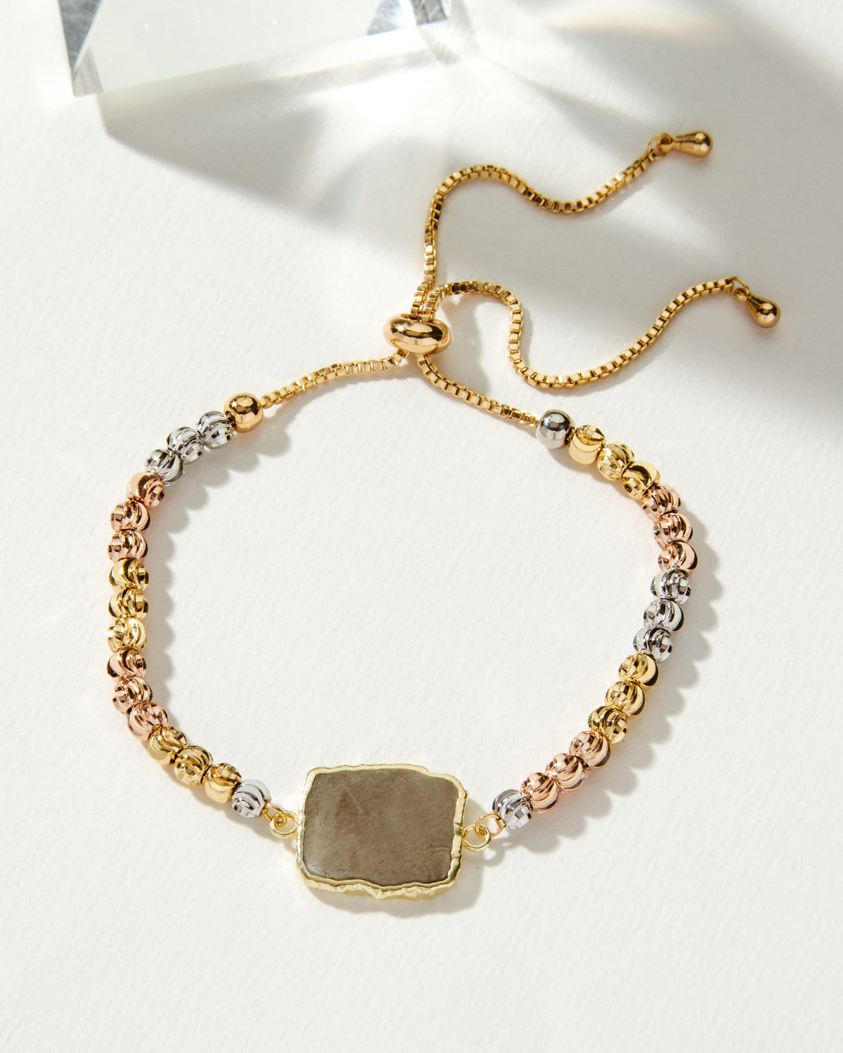 Eterno Amore Gemma Adjustable Bracelet with silver, gold, and rose gold beads and pyrite gemstone.