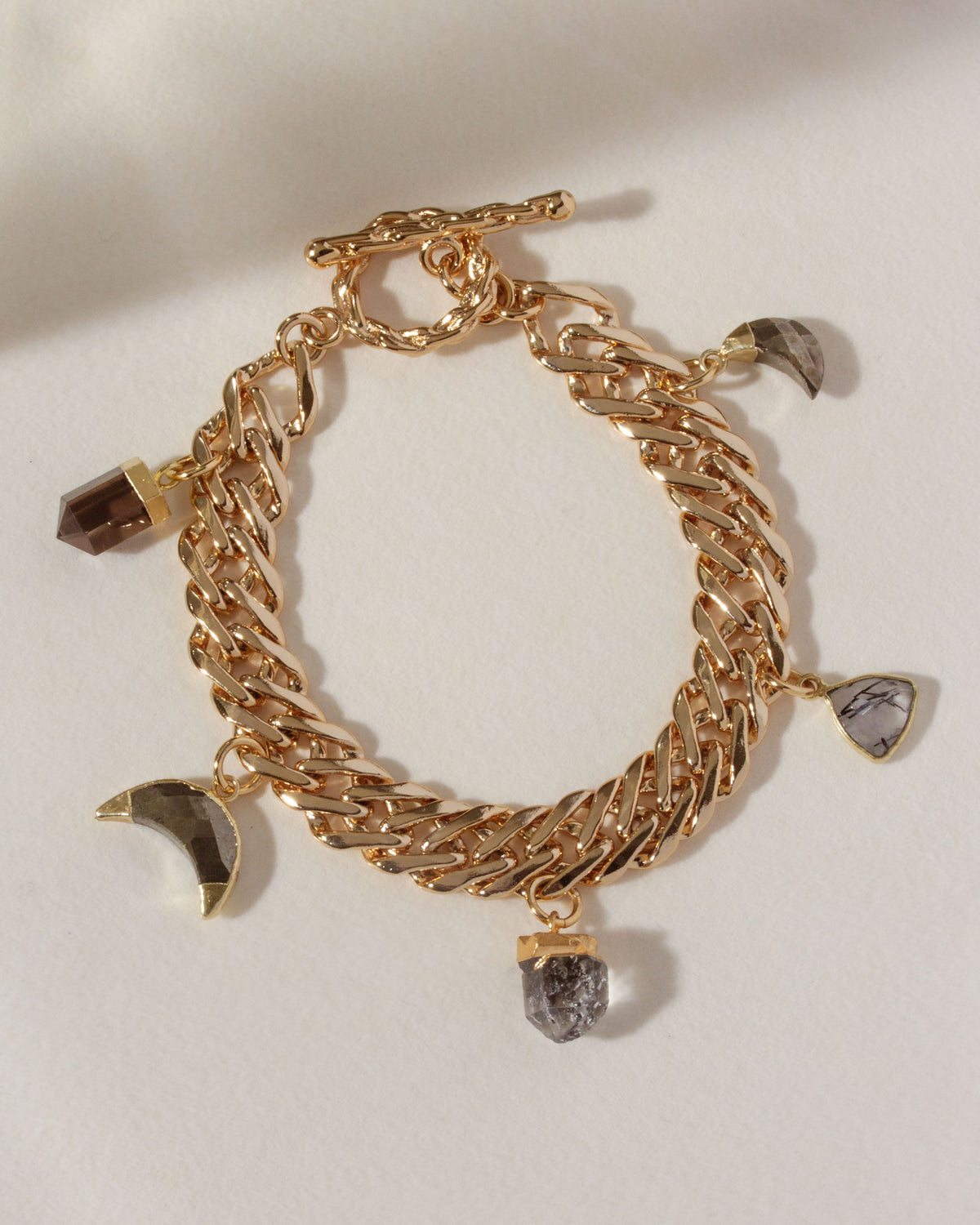 Gold Earthly Treasures Gemstone Charm Bracelet with Smoky and Tourmalinated Quartz.