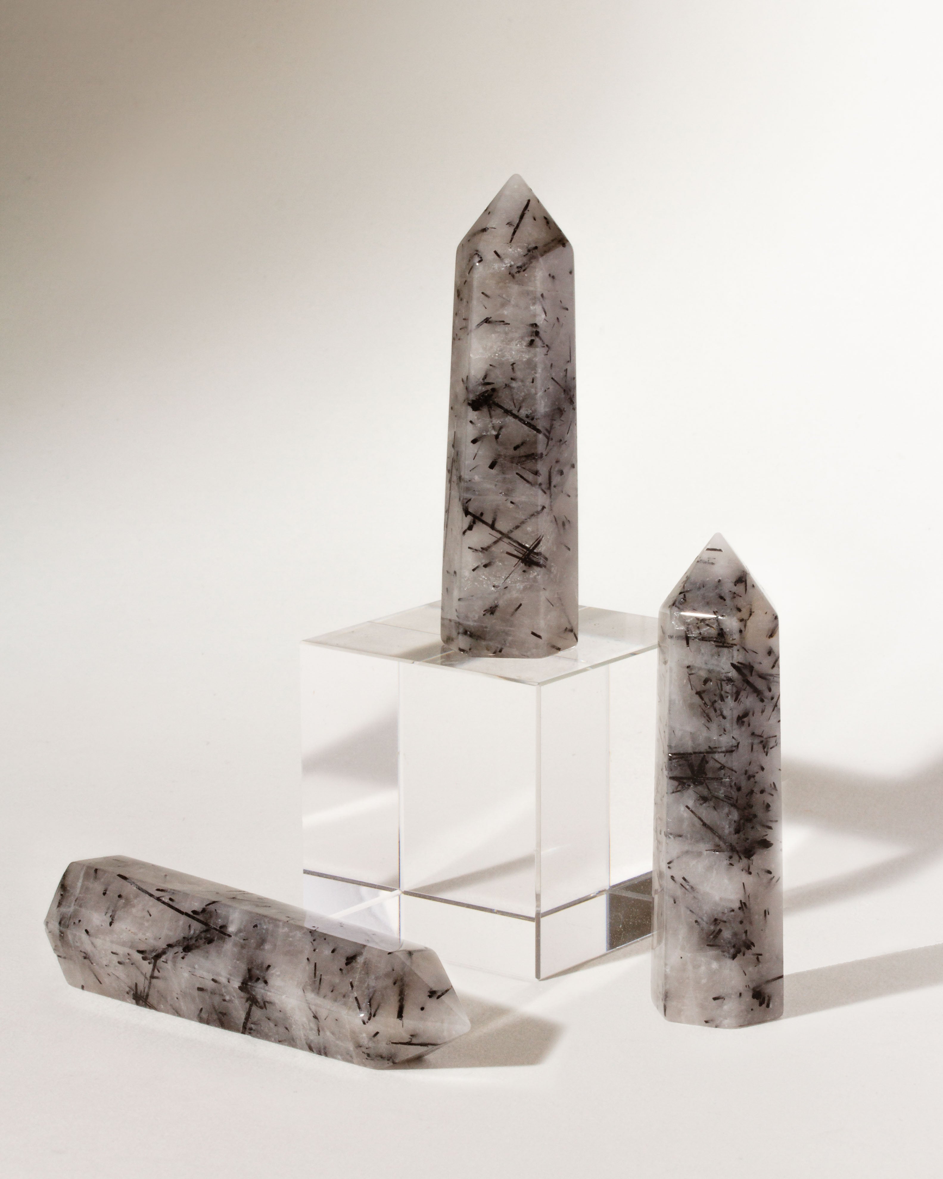 Tourmalinated quartz towers showing hexagonal shapes and dark inclusions
