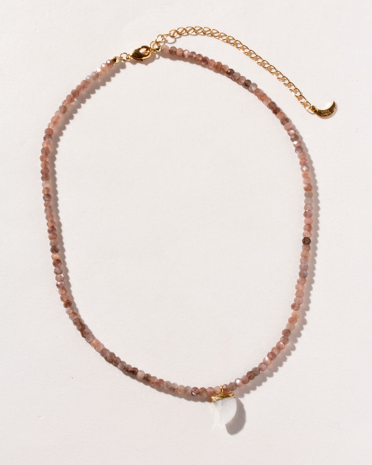 Collar necklace with coffee moonstone beads and carved rainbow moonstone shark-tooth shaped charm