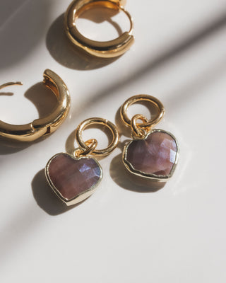 Pair of coffee moonstone heart shaped gold hoop earrings.