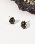 Down to Earth post earrings in sterling silver, featuring reddish-brown geode stones.