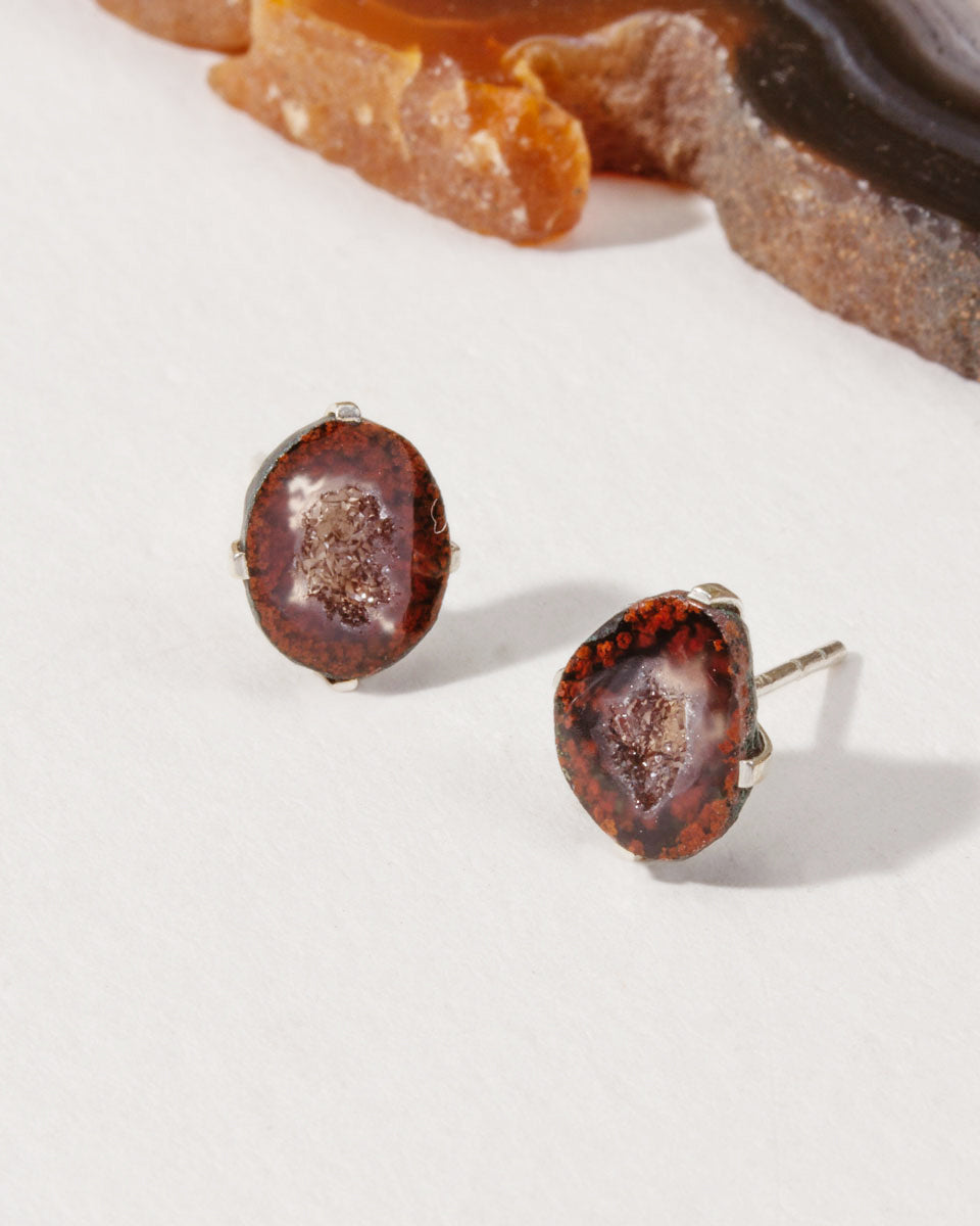 Down to Earth Post Earrings with reddish-brown geode in a sterling silver bezel setting.