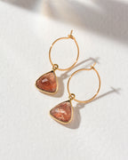 Bermuda Triangle Mini Hoops with a sunstone gemstone and gold hoops.