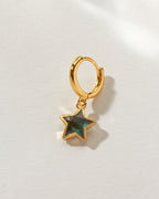 Seastar Solo Hoop Earring with a gold huggie hoop and Labradorite star-shaped gemstone dangle.