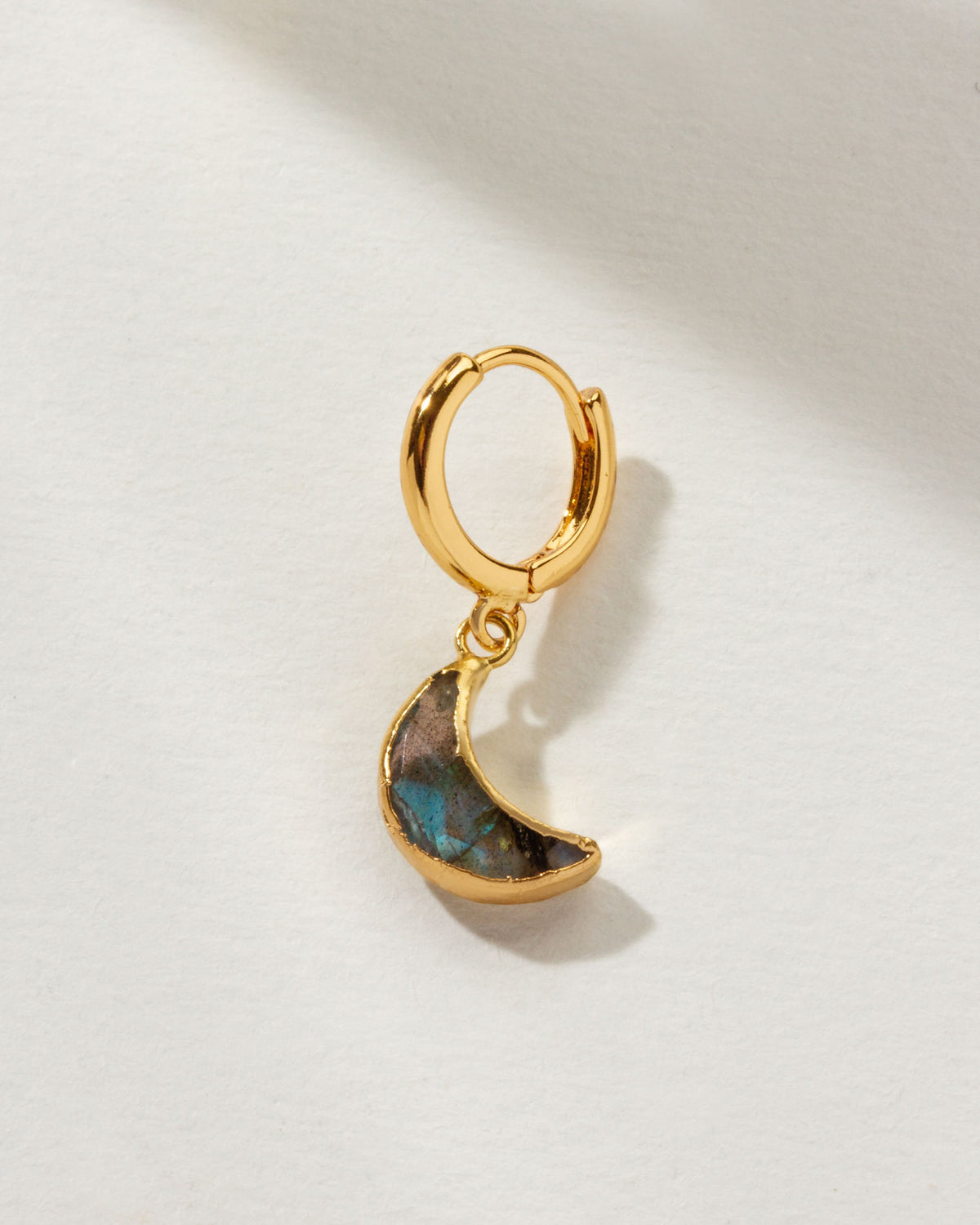 Lunar Loop gold hoop earring with a crescent labradorite charm