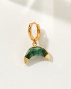 Celestial Curve Solo Hoop Earring with an emerald gemstone and gold huggie hoop.