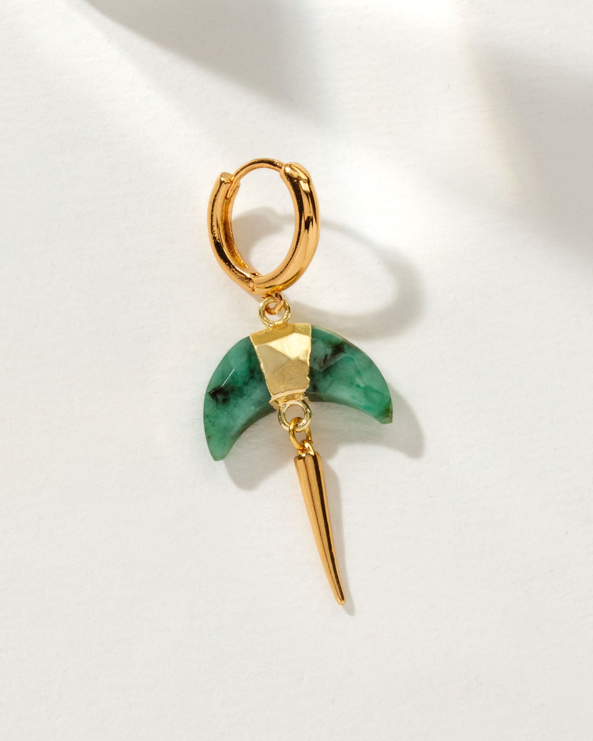 Crescent Quill Dangler Solo Hoop Earring with Emerald gemstone and golden hoop.