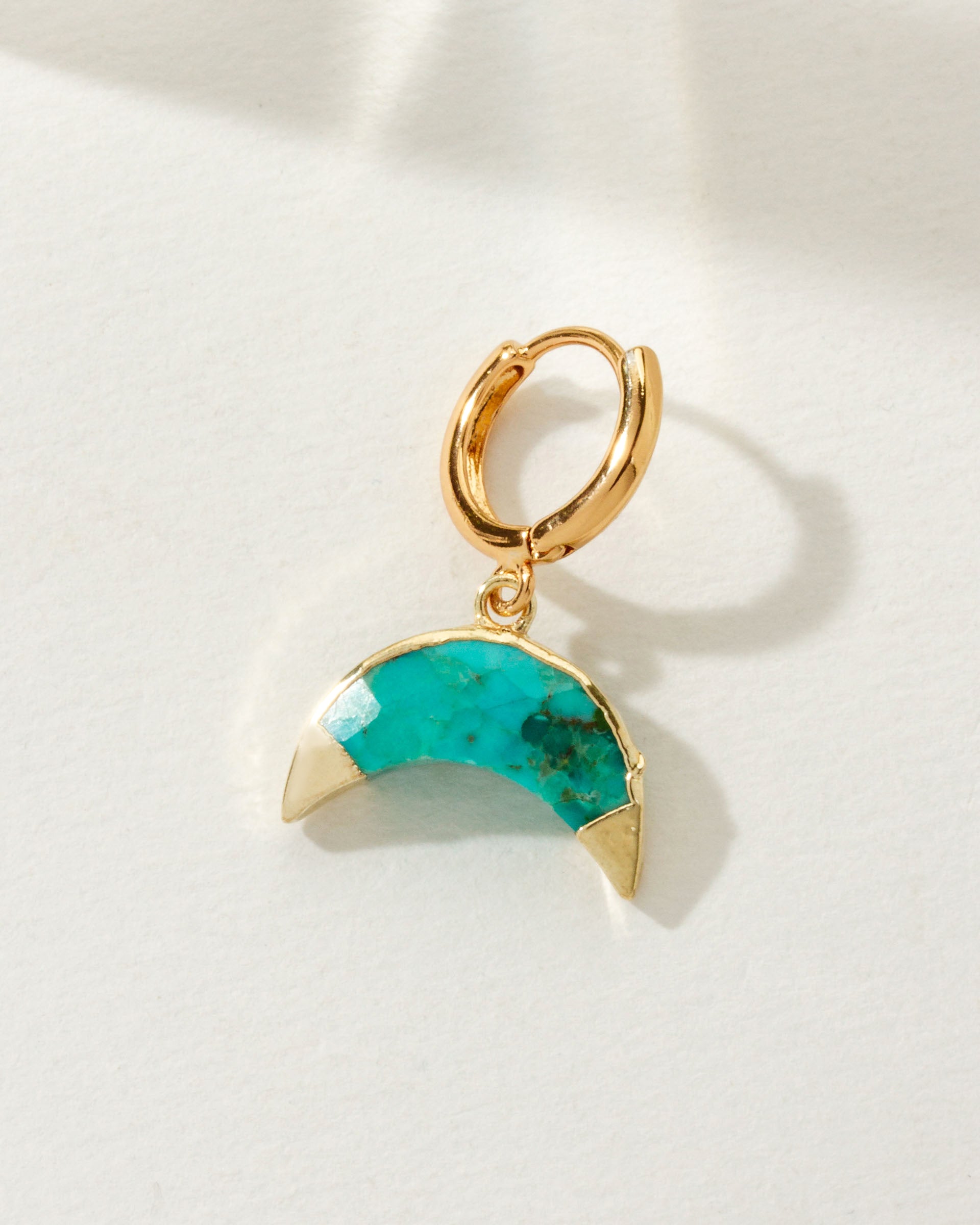 Celestial Curve Solo Hoop Earring with a Turquoise gemstone.