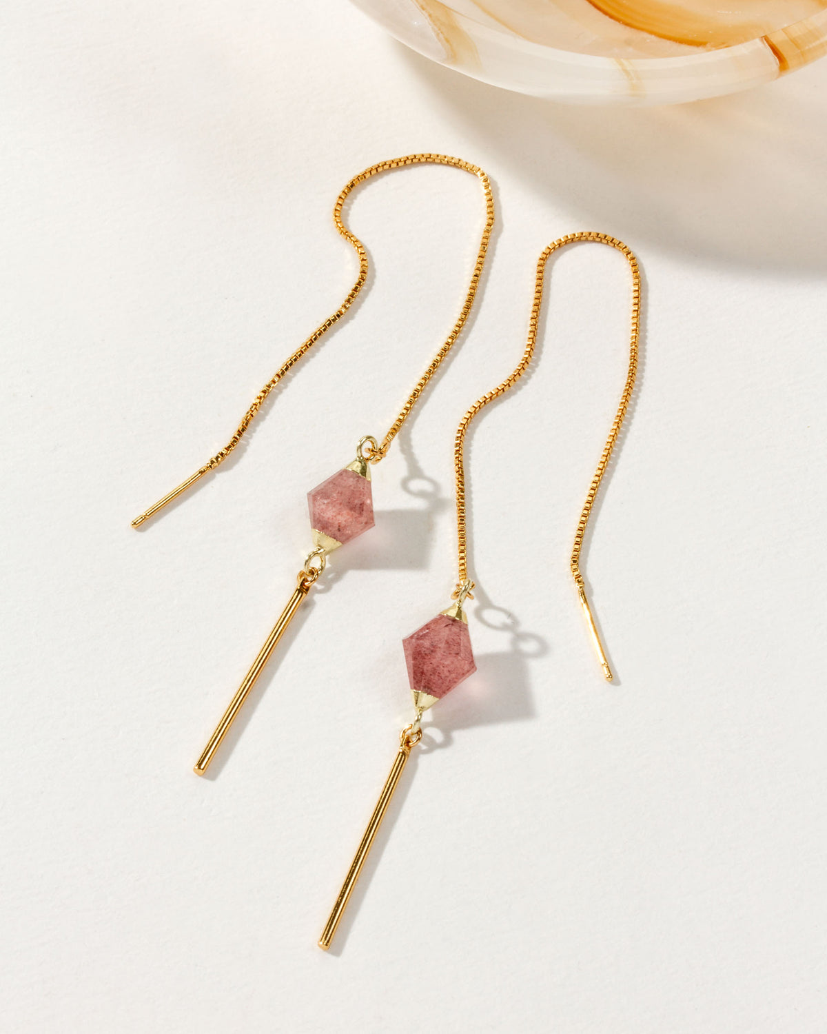 Pendulum Threader Earring with Strawberry Quartz and gold chain and rod.