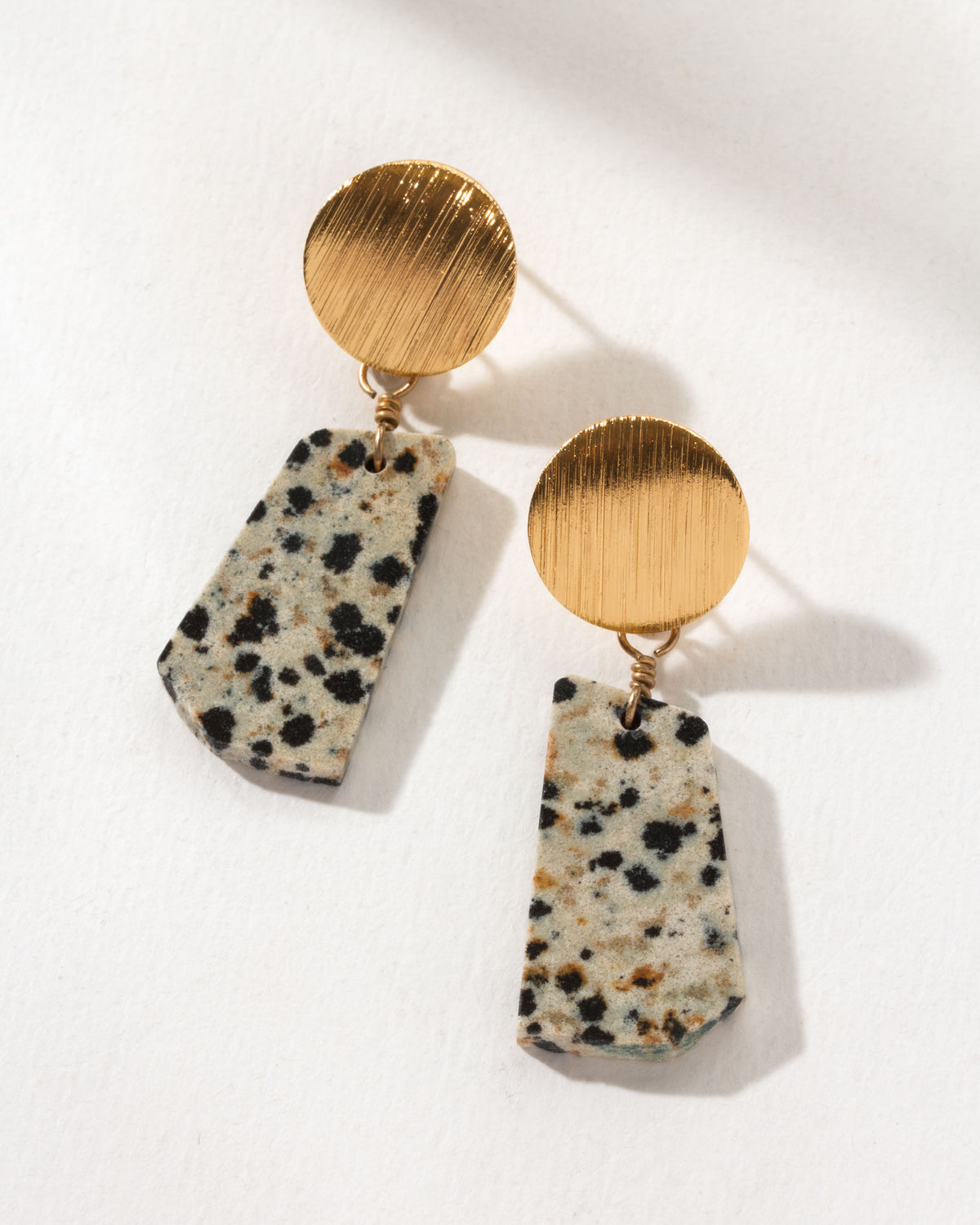 Pair of Wild Thing Doorknocker Post Earrings with brushed gold posts and Dalmatian Jasper stones.