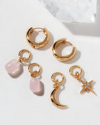 Constella hoop set with rose quartz drops, gold moon, and jeweled North Star charms