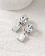Silver plated wide huggie hoop earring with bezel set moonstone charm