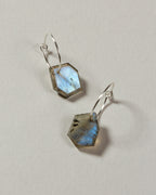 Labradorite geometric shaped sterling silver hoop hearings on a white background.