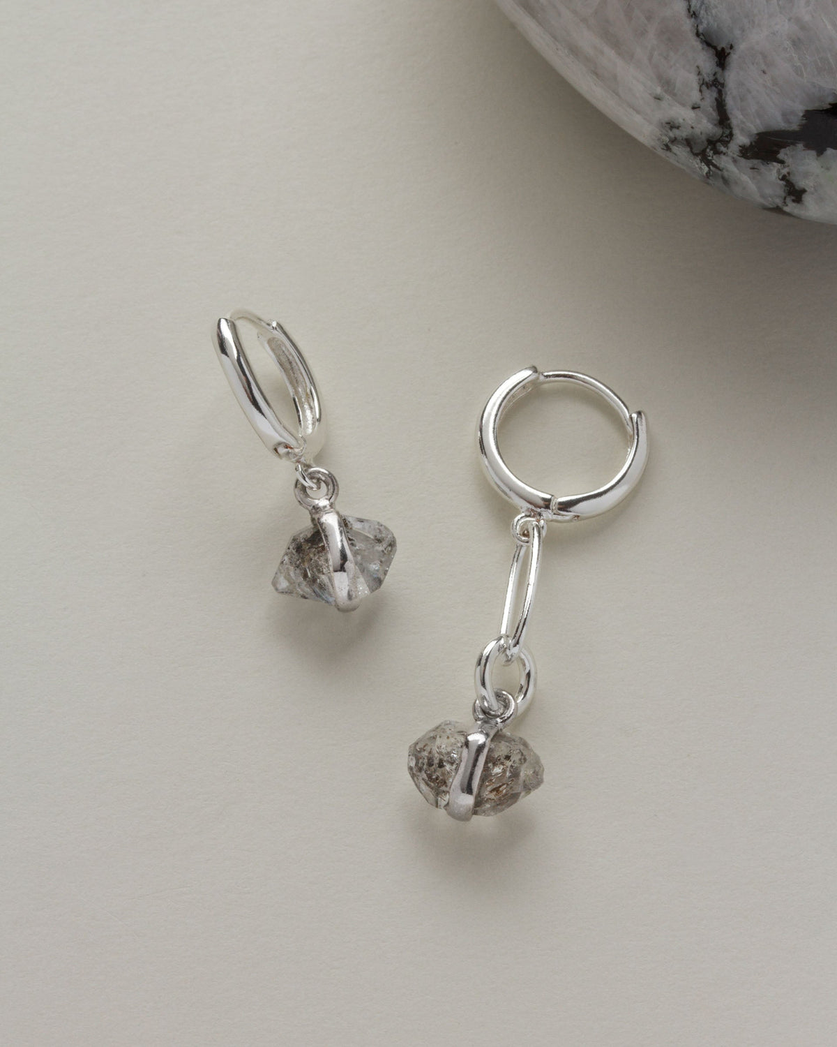 Mismatched Silver Plated Herkimer Quartz drop earrings.
