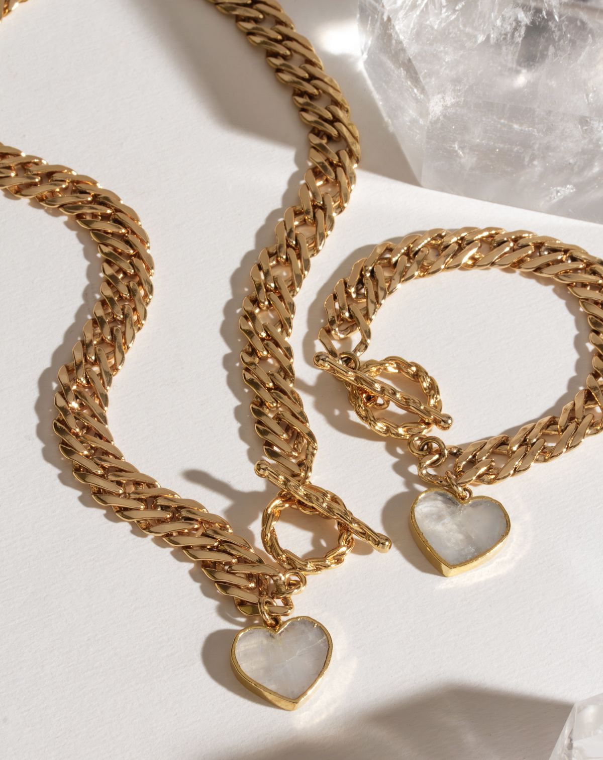 Heart of Gold Toggle Necklace and bracelet with Mother of Pearl heart pendants.
