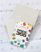 Pride 365' gift wrap packaging with gem illustrations. Includes box, envelope, and tissue.