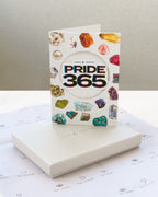 Pride 365' gift wrap packaging with gem illustrations. Includes box, envelope, and tissue.