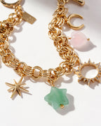 Gold-plated bracelet with a heart, a flower, a star charms, and gem beads.