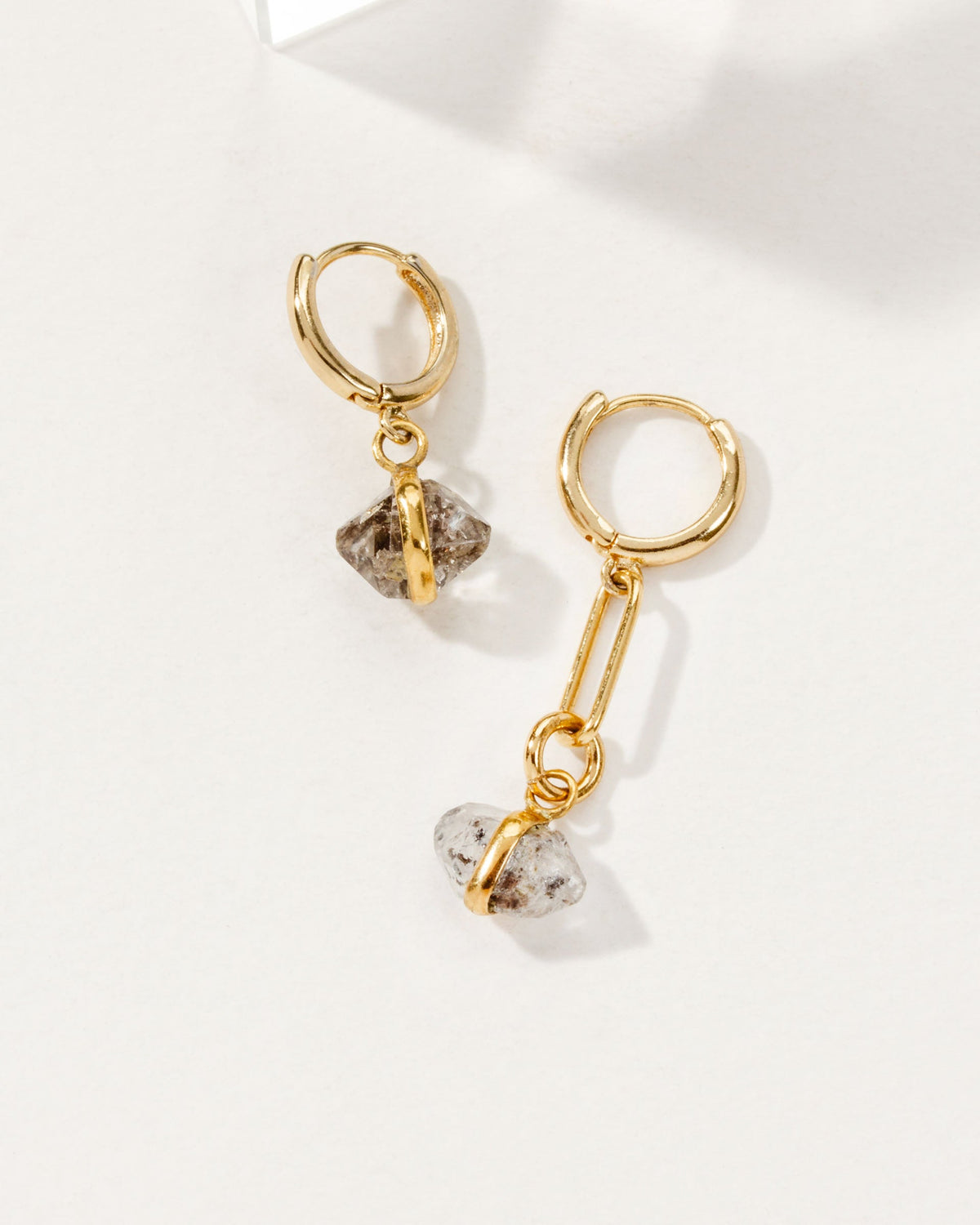 Mismatched 14KT gold plated brass earrings with Herkimer Quartz stones.