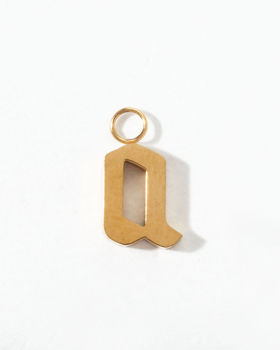 Gold letter 'q' charm