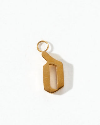 Gold letter "o" charm on a white background