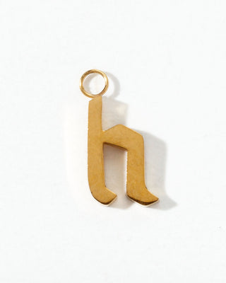 Gold letter 'h' pendant on a white background