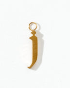 Gold pendant shaped like the letter 'J' on a white background
