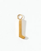 Gold letter 'L' charm on a white background