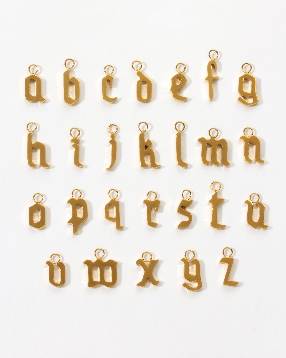 Alphabet of gold letter charms A through Z