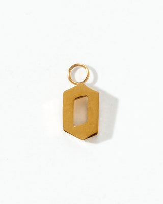 Gold letter "o" charm on a white background