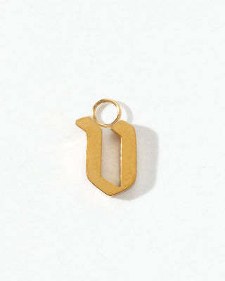 Gold letter 'V' charm on a white background