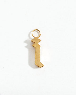 Gold letter "i" charm on a white background.