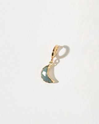 Gold aquamarine heart c-clasp pendant on a light gray background