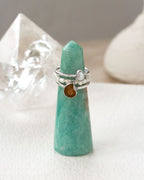 Amazonite ring tower with silver ammonite and pearl rings, plus a pearl stretch ring