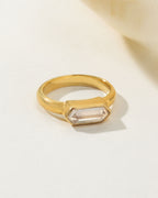 Gold Kaleidoscope ring with a Clear Quartz gemstone.