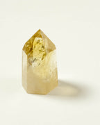 Yellow crystal on a white background