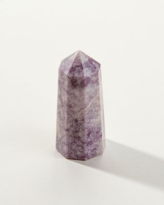 Purple Lepidolite Gemstone Tower on a white background.