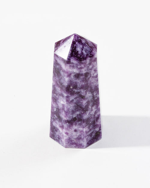 Lepidolite Gemstone Tower on a white background.