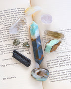 Mineral specimens on an open book