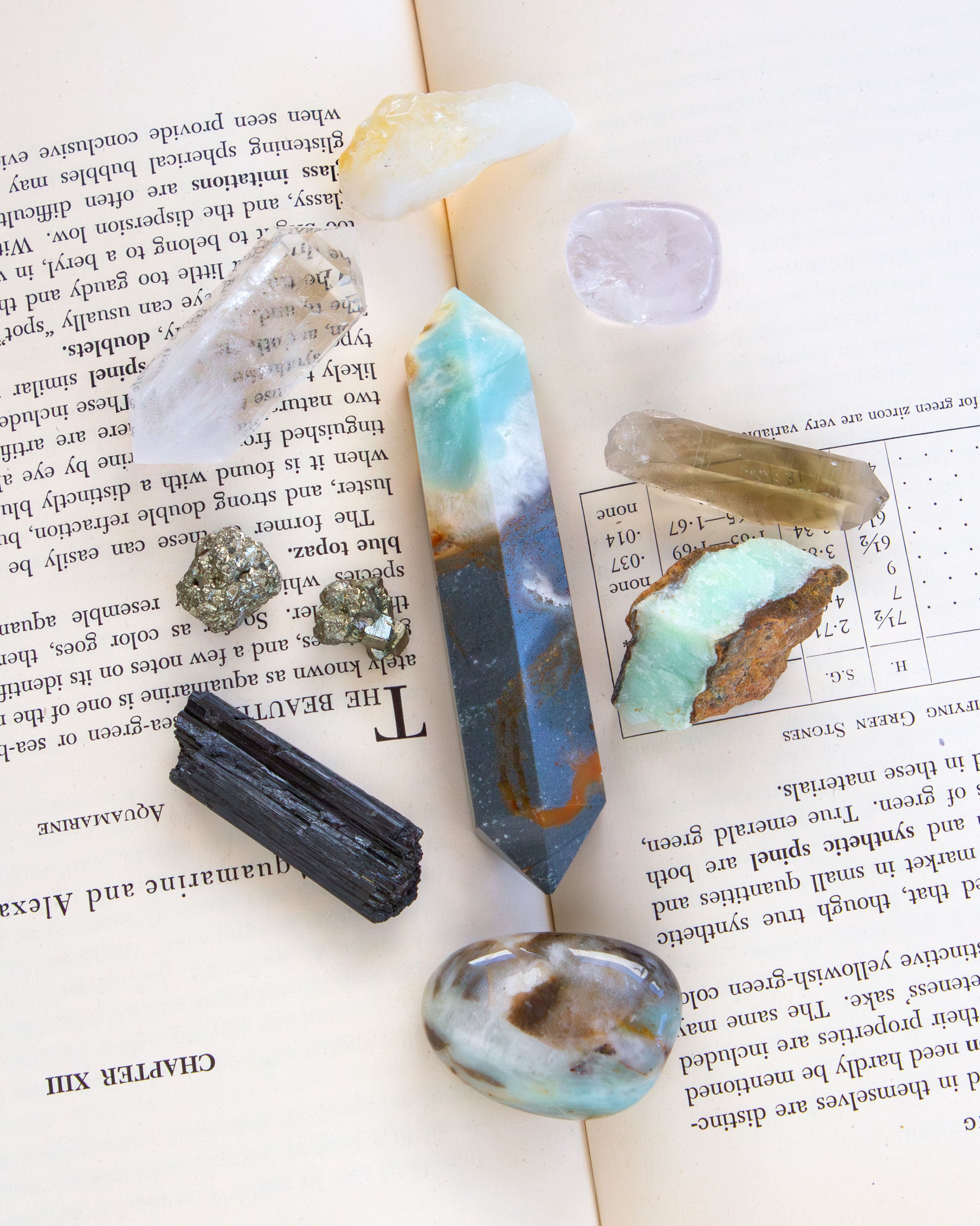 Mineral specimens on an open book