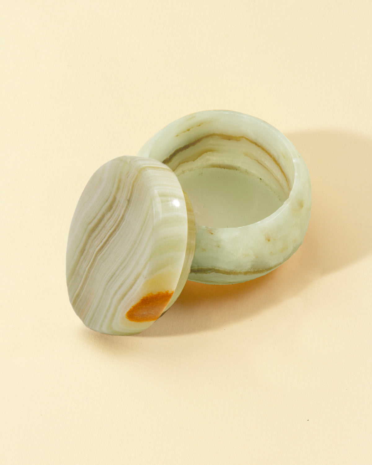 Open Harmony Calcite jewelry box carved from banded calcite.