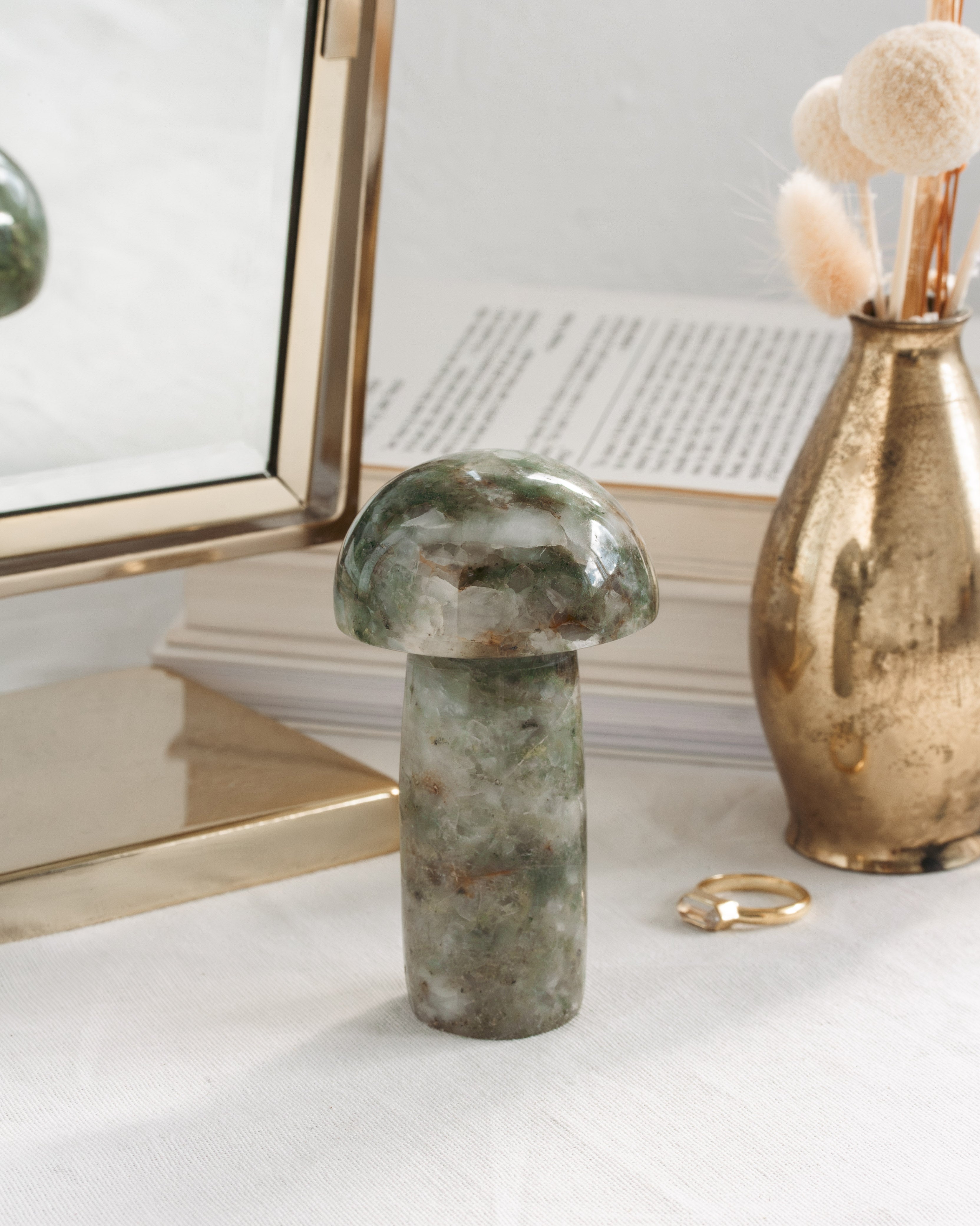Decorative green stone mushroom sculpture
