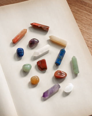 Collection of various crystals on a white surface